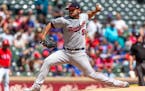 Minnesota Twins pitcher Gabriel Moya delivers during the first inning of a baseball game, Sunday against the Texas Rangers, Sept. 2, 2018, in Arlingto