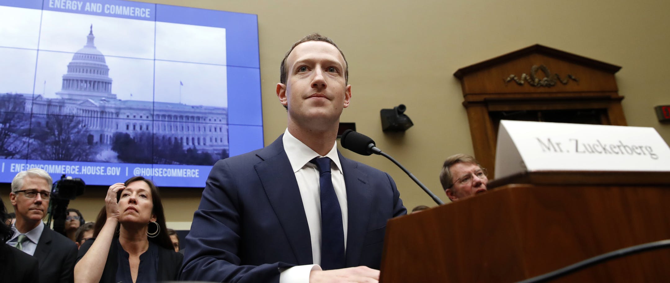 Facebook CEO Mark Zuckerberg returns after a break to continue testifying at a House Energy and Commerce hearing on Capitol Hill in Washington, Wednesday, April 11, 2018, about the use of Facebook data to target American voters in the 2016 election and data privacy. (AP Photo/Jacquelyn Martin)