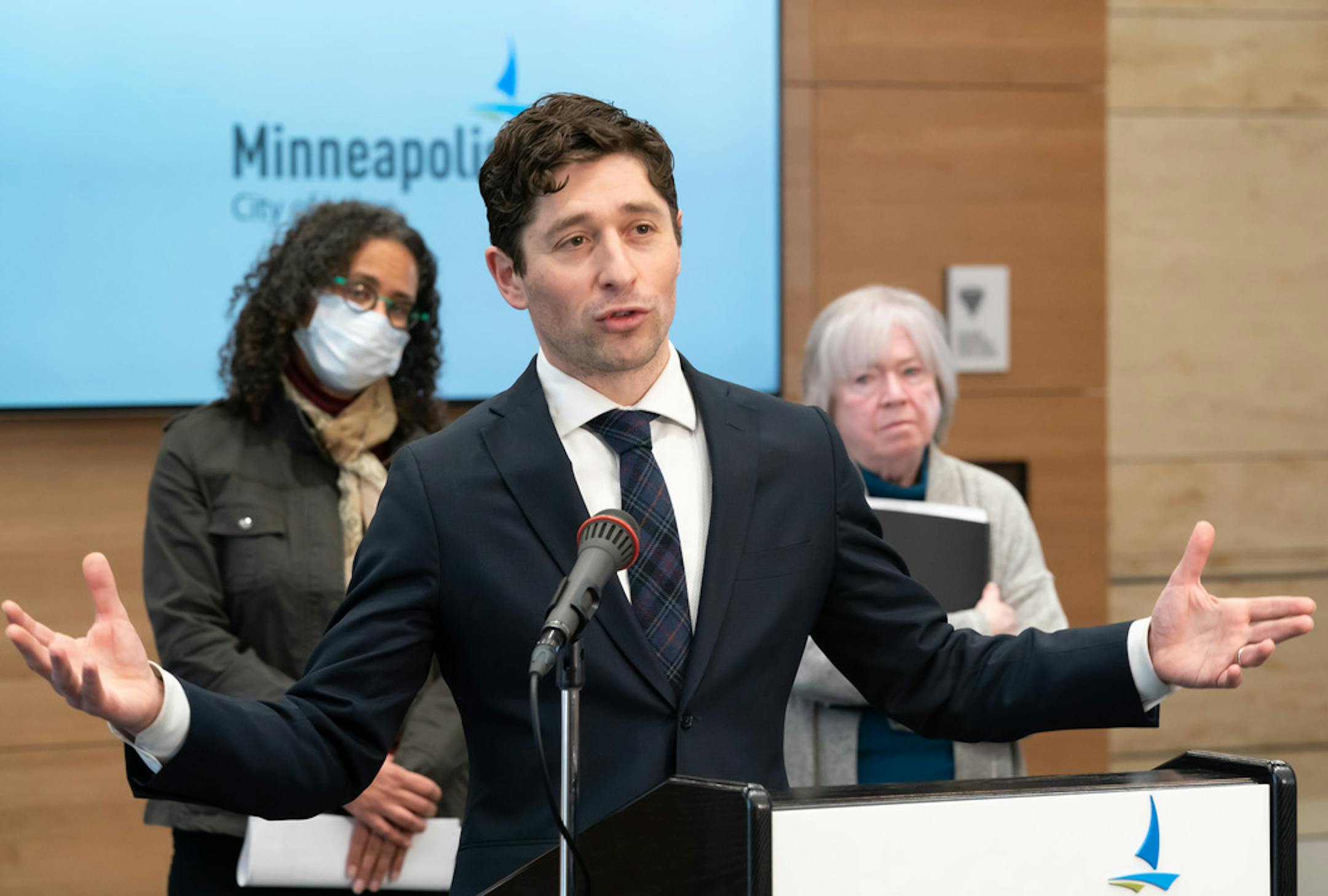 Mayor Jacob Frey spoke at the press conference, behind him are co-chairs of the work group, Pizza Lucé CEO JJ Haywood and former City Council Member Kathleen O'Brien, Friday, March 4, 2022 Minneapolis, Minn. Members of a workgroup tasked with providing recommendations on how Minneapolis should set up its new "strong mayor" system of government release their findings Friday morning. ] GLEN STUBBE • glen.stubbe@startribune.com