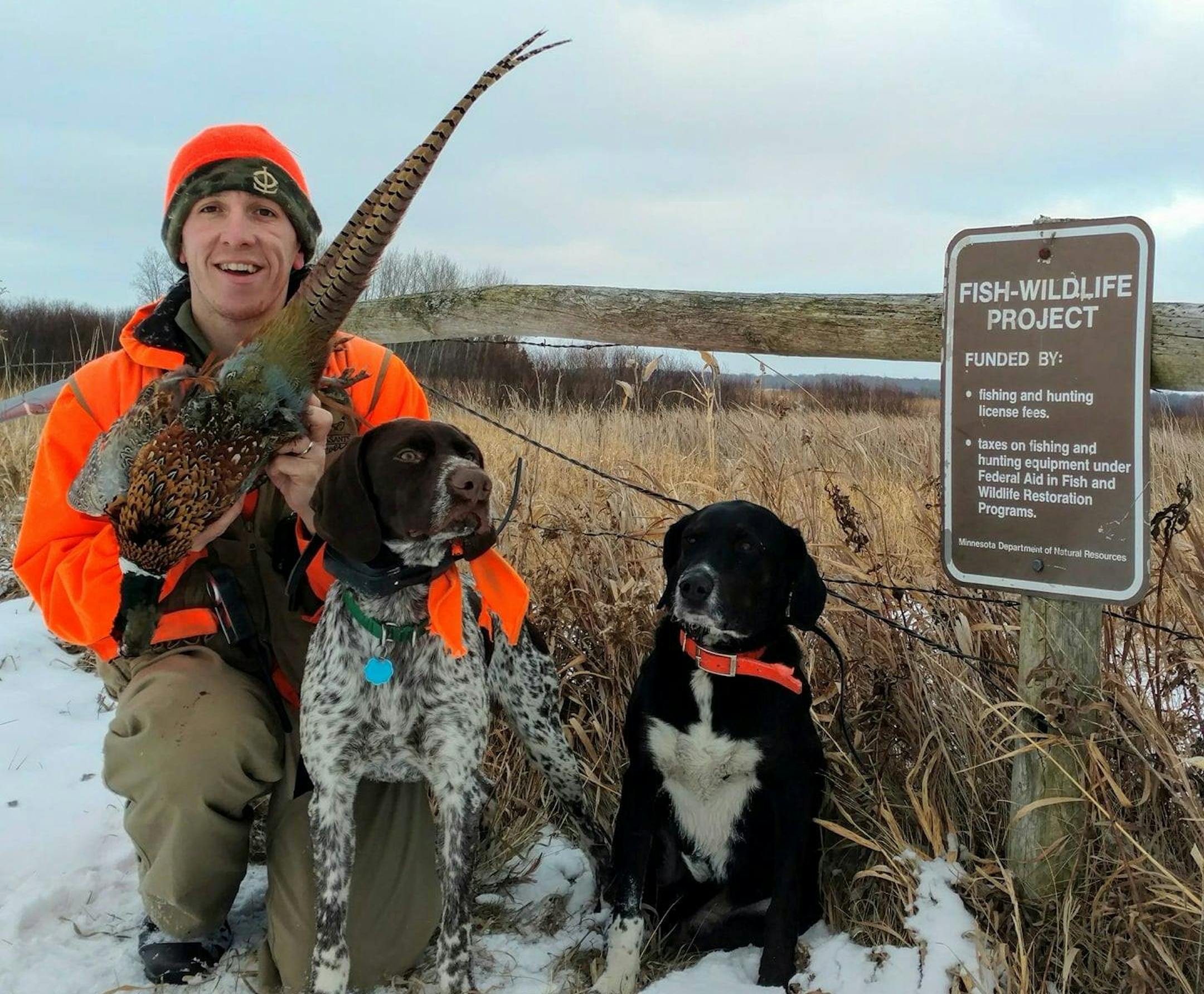Sabin Adams of Pheasants Forever, living outside of Clarissa, Minn., his wife Sara and 3-year-old son Briar weren't home last December when their house burned down. But the family lost their two dogs, shown here, Remnar and Daisy, in the blaze. ORG XMIT: FI-vDikvXkCW8VrAPJ-s