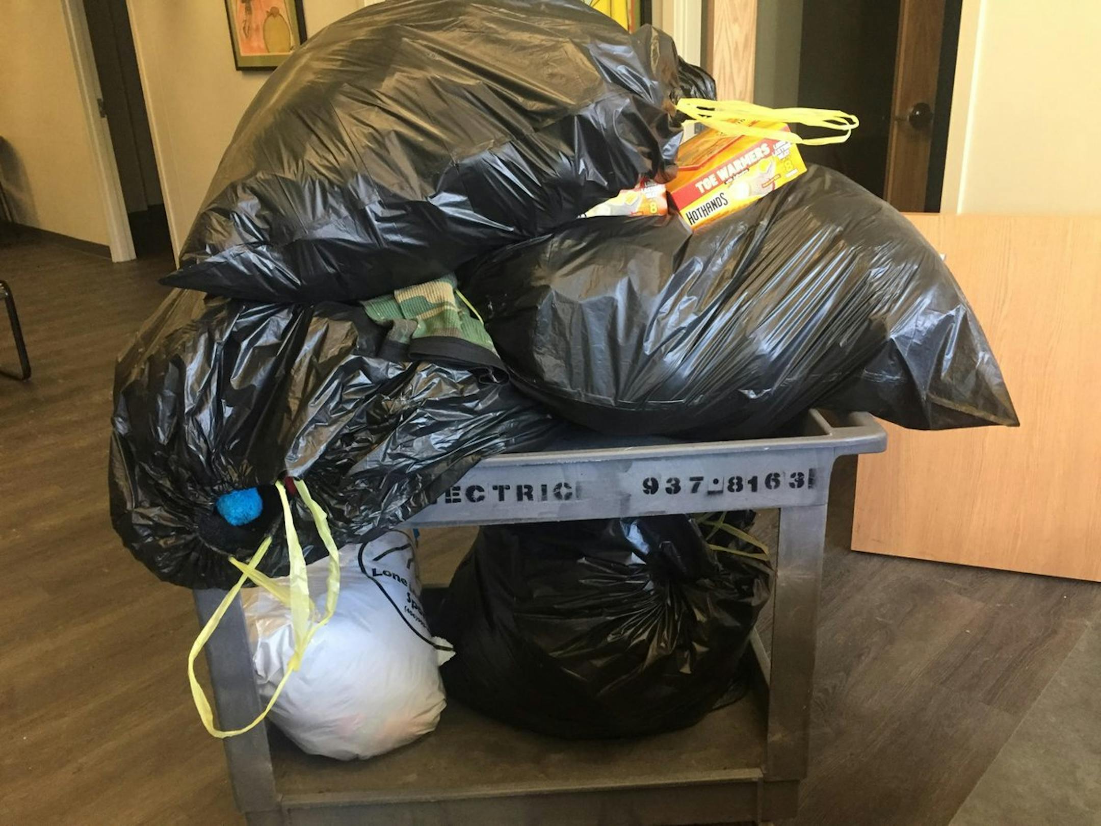 Pass Your Parka dropped off a cart this week full of extra winter gear donated from Super Bowl visitors to St. Stephen's Human Services.