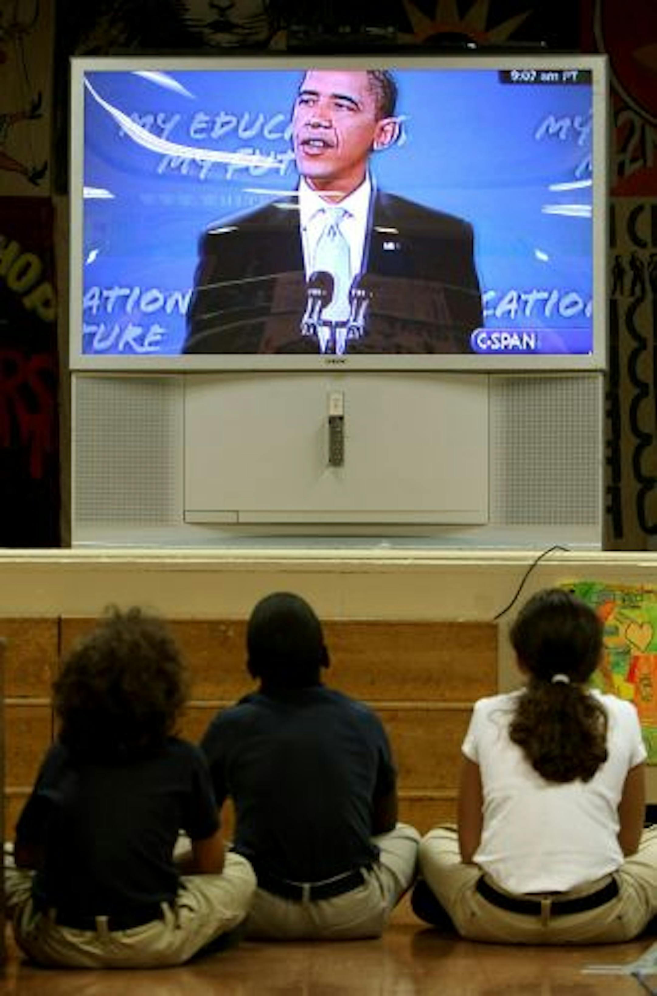 NEW YORK - SEPTEMBER 08: Manhattan Charter School students watch the National Address to Students on Educational Success by U.S. President Barack Obama September 8, 2009 in New York City. U.S. Secretary of State Hillary Rodham Clinton spoke to students beforehand at a "My Education, My Future" event at the school.