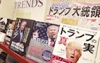 Books on President-elect Donald Trump are displayed on a special shelf set up at the Yaesu Book Center in Tokyo, Thursday, Nov. 10, 2016. The section 