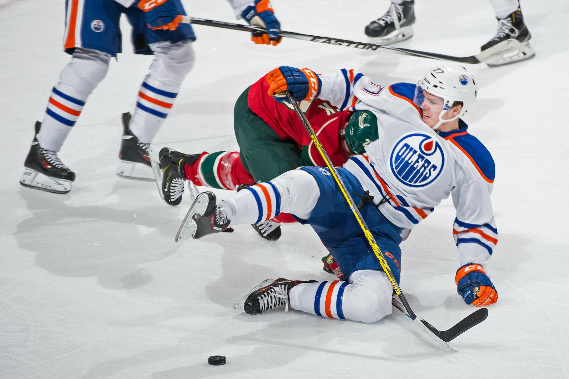 Minnesota Wild left wing Thomas Vanek (26) took Edmonton Oilers center Connor McDavid (97) down the ice while chasing after the puck in the first period. ] (AARON LAVINSKY/STAR TRIBUNE) aaron.lavinsky@startribune.com The Minnesota Wild played the Edmonton Oilers on Tuesday, Oct. 27, 2015 at Xcel Energy Center in St. Paul, Minn.