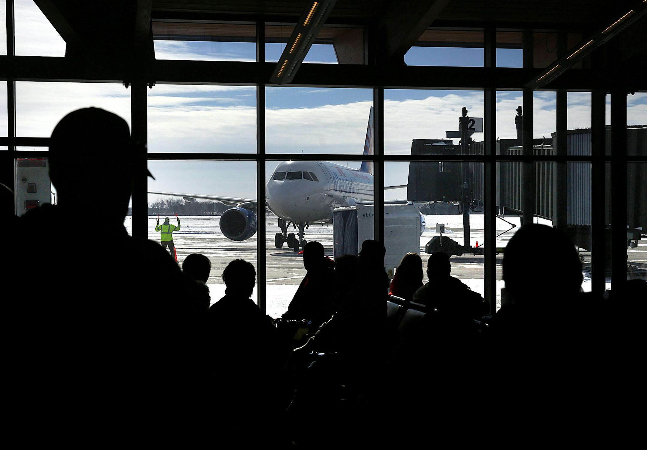 Passengers watch the arrival of a flight from Phoenix in the terminal at the St. Cloud Regional Airport in anticipation of boarding the aircraft for the return flight to Arizona. ] JIM GEHRZ ‚Ä¢ jgehrz@startribune.com / St. Cloud, MN / February 26, 20134/ 11:00 AM - BACKGROUND INFORMATION: Five years after Delta pulled its service from Minnesota's smaller airports amid a dismal time for airlines, there are signs of resurgence. St. Cloud will start daily service to Chicago soon.