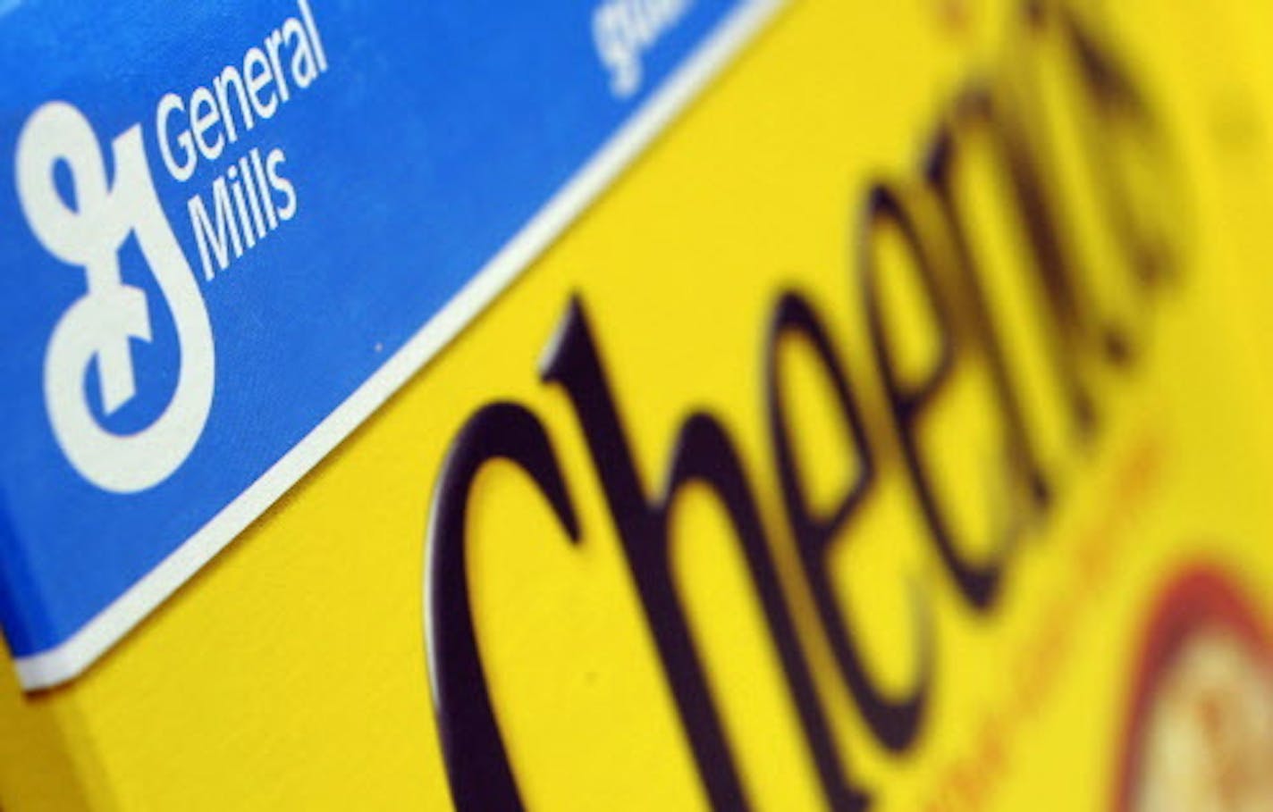 FILE - In this Dec. 15, 2007 file photo, a box of General Mills' Cheerios is seen on a shelf at a Shaw's Supermarket in Gloucester, Mass. General Mills says it will start labeling products across the country that contain genetically modified ingredients to comply with a law that is set to go into effect in Vermont. The maker of Cheerios cereal, Progresso soups and Yoplait yogurt notes it is impractical to label its products for just one state, so the disclosures required by Vermont starting in J