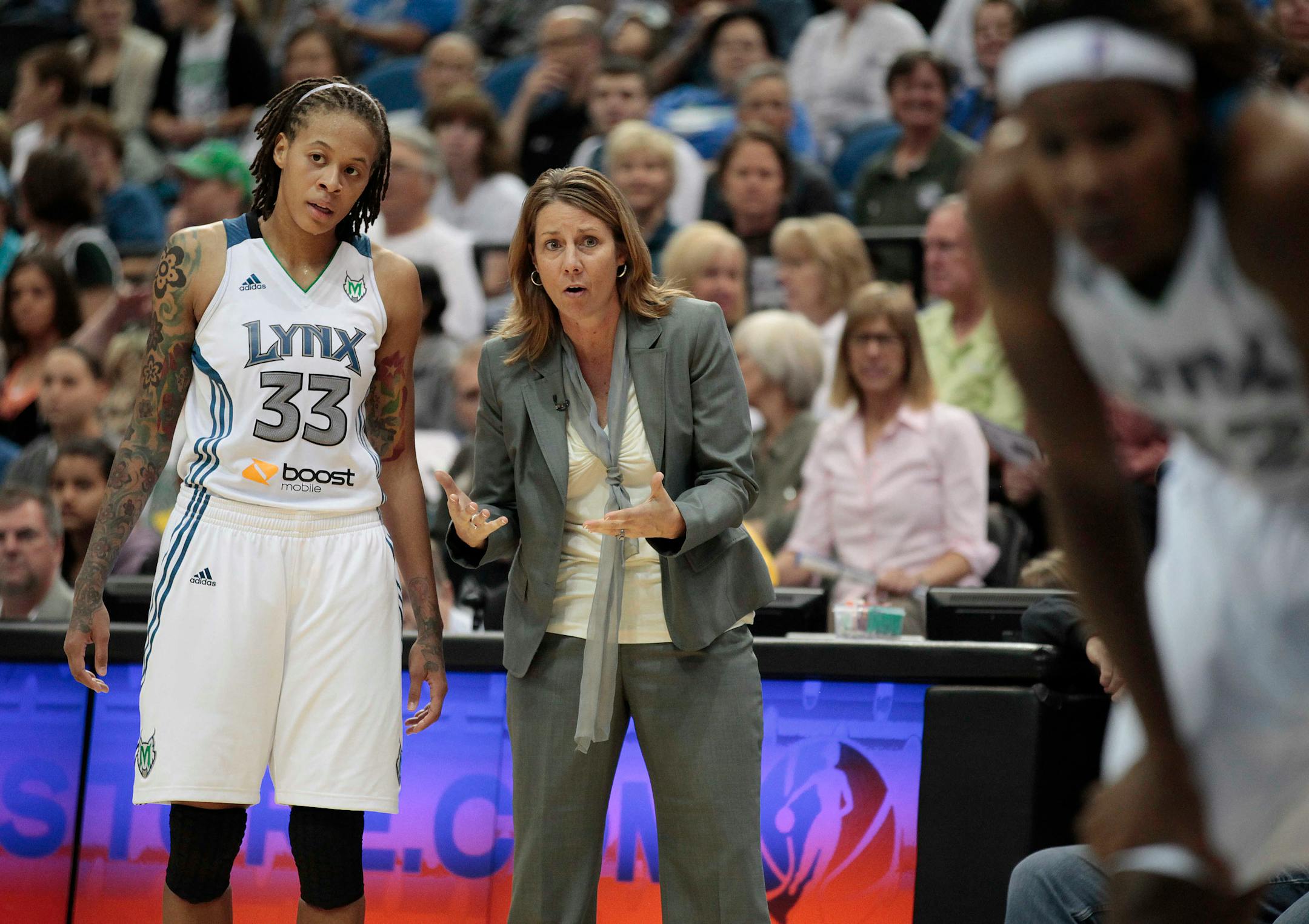 Lynx star Seimone Augustus, left, and coach Cheryl Reeve
