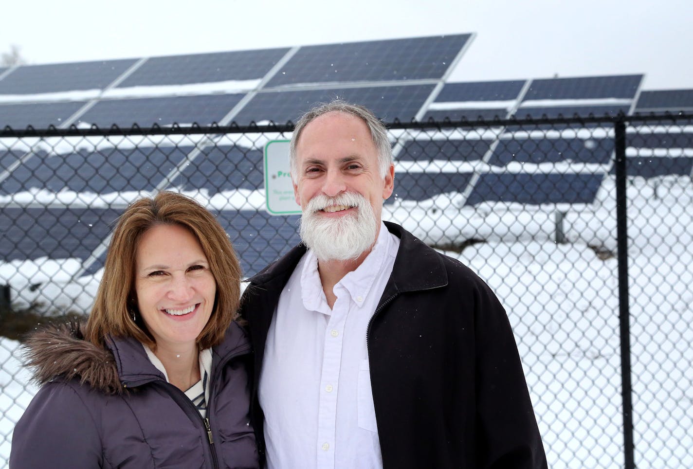 Kevin and Cathy Palmer of Blaine bought six solar panels through Connexus Energy for their home in Blaine. They believe "it's time" to look to renewable energy as the planet is warming. They were photographed outside Connexus Energy's solar garden Friday, Jan.8, 2015, in Ramsey, MN.](DAVID JOLES/STARTRIBUNE)djoles@startribune.com Minnesota's largest shared solar power project built at Connexus Energy's headquarters in 2014 finally sold out this week, two months after the cooperative began offeri