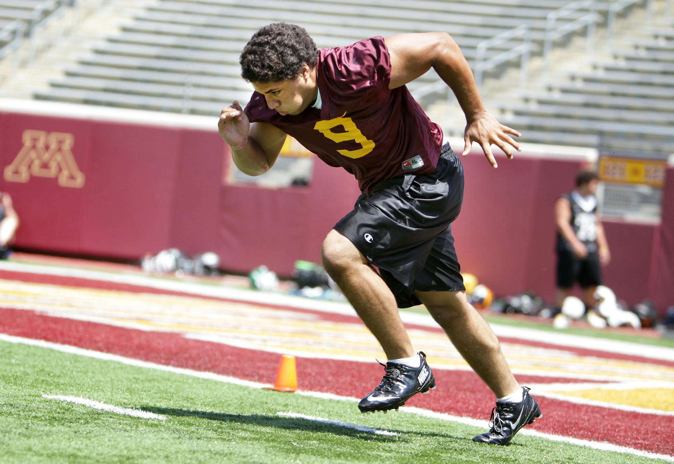 William Rains, a running back from Eastview High School in Apple Valley, and other juniors-to-be attended the University of Minnesota's Elite Junior football camp at TCF Bank Stadium in Minneapolis July 21, 2013. (Courtney Perry/Special to the Star Tribune)