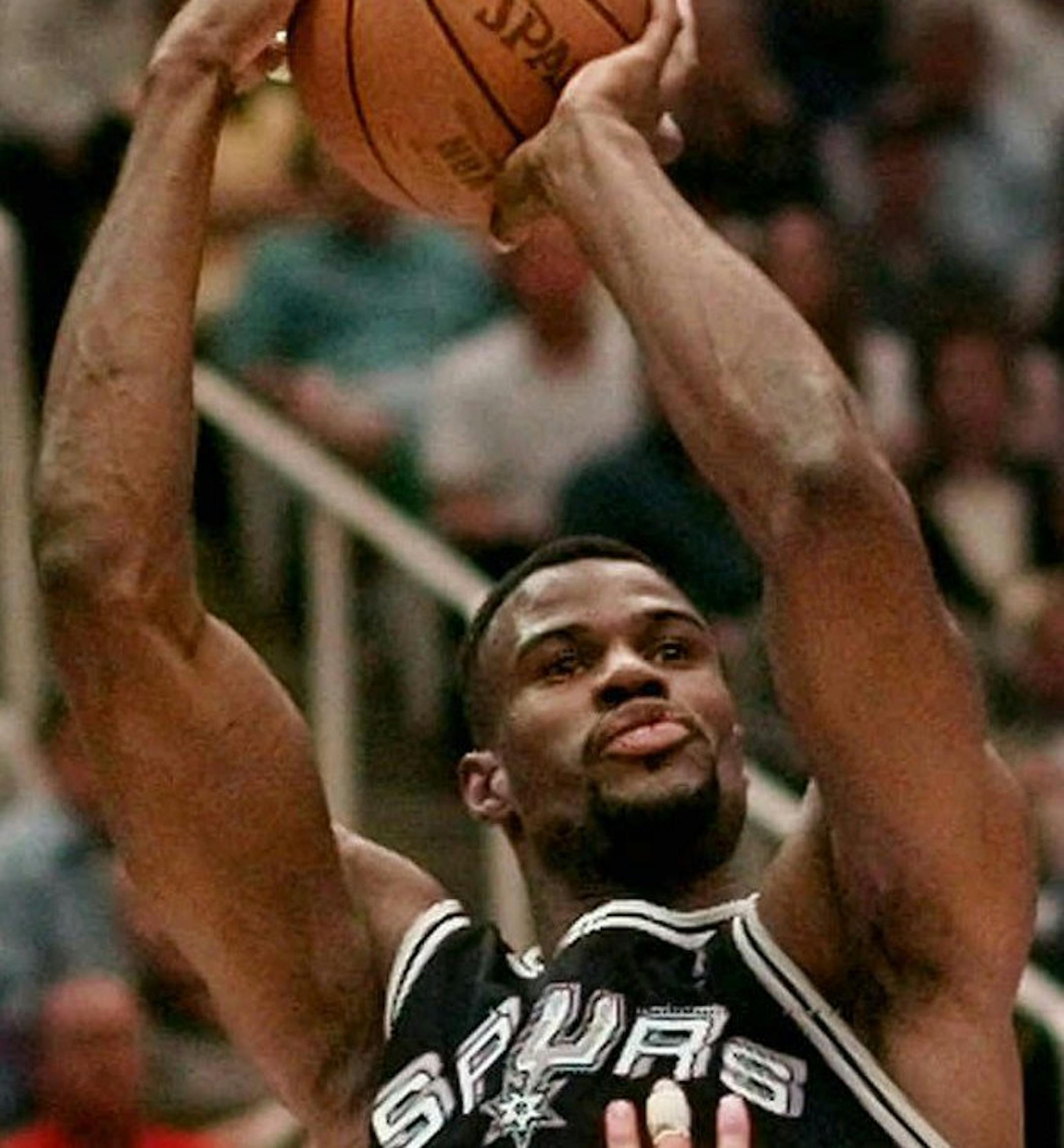 Utah Jazz's Greg Foster (44) attempts to block the shot of San Antonio Spurs' David Robinson during the first half of their playoff game Thursay night, May 7, 1998, in Salt Lake City, Utah. (AP Photo/Mark J. Terrill) ORG XMIT: SLCC102