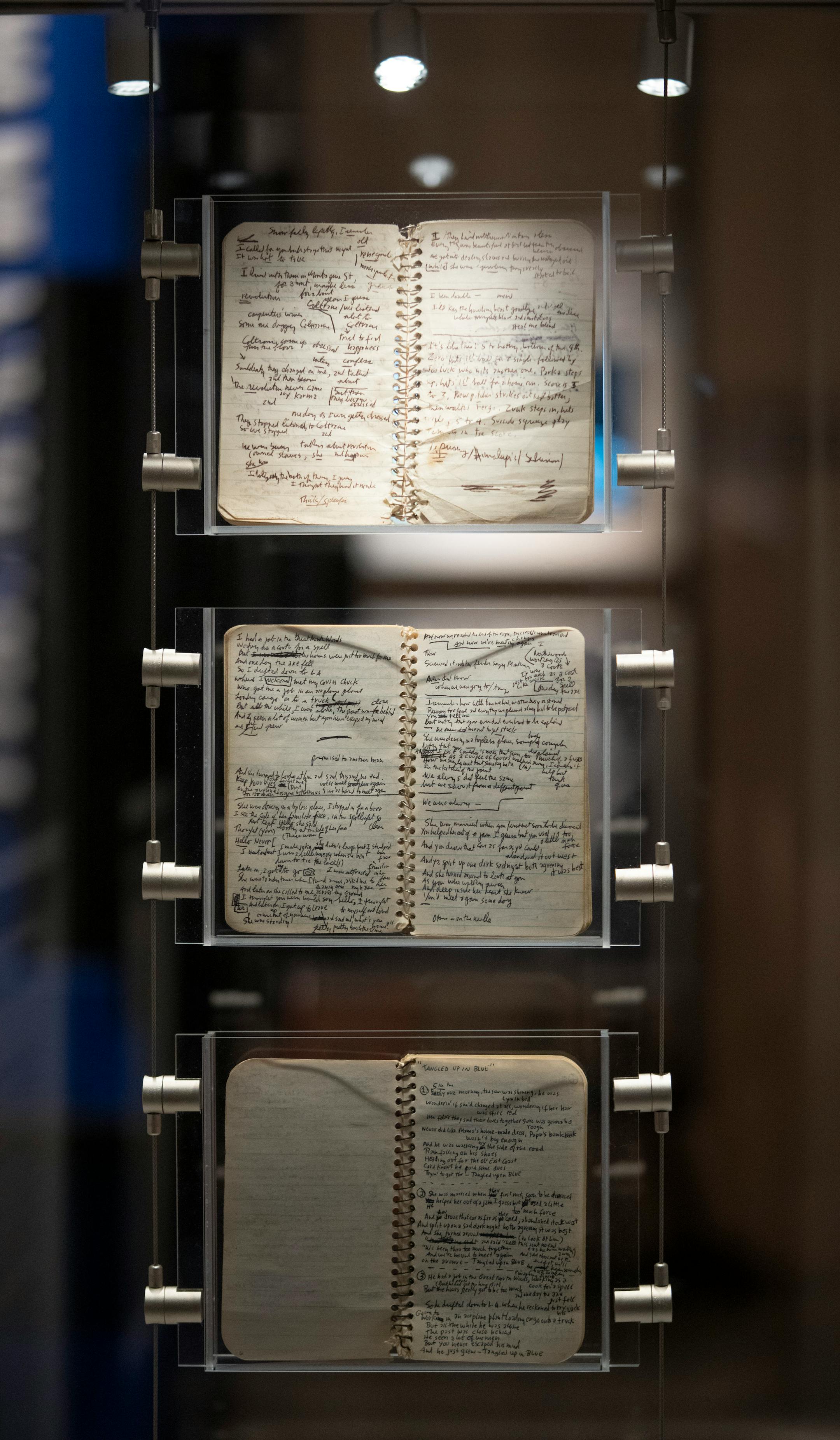 The notebooks Bob Dylan used to draft lyrics for "Blood on the Tracks" have been reunited for the first time for a display about the creation of the seminal album.