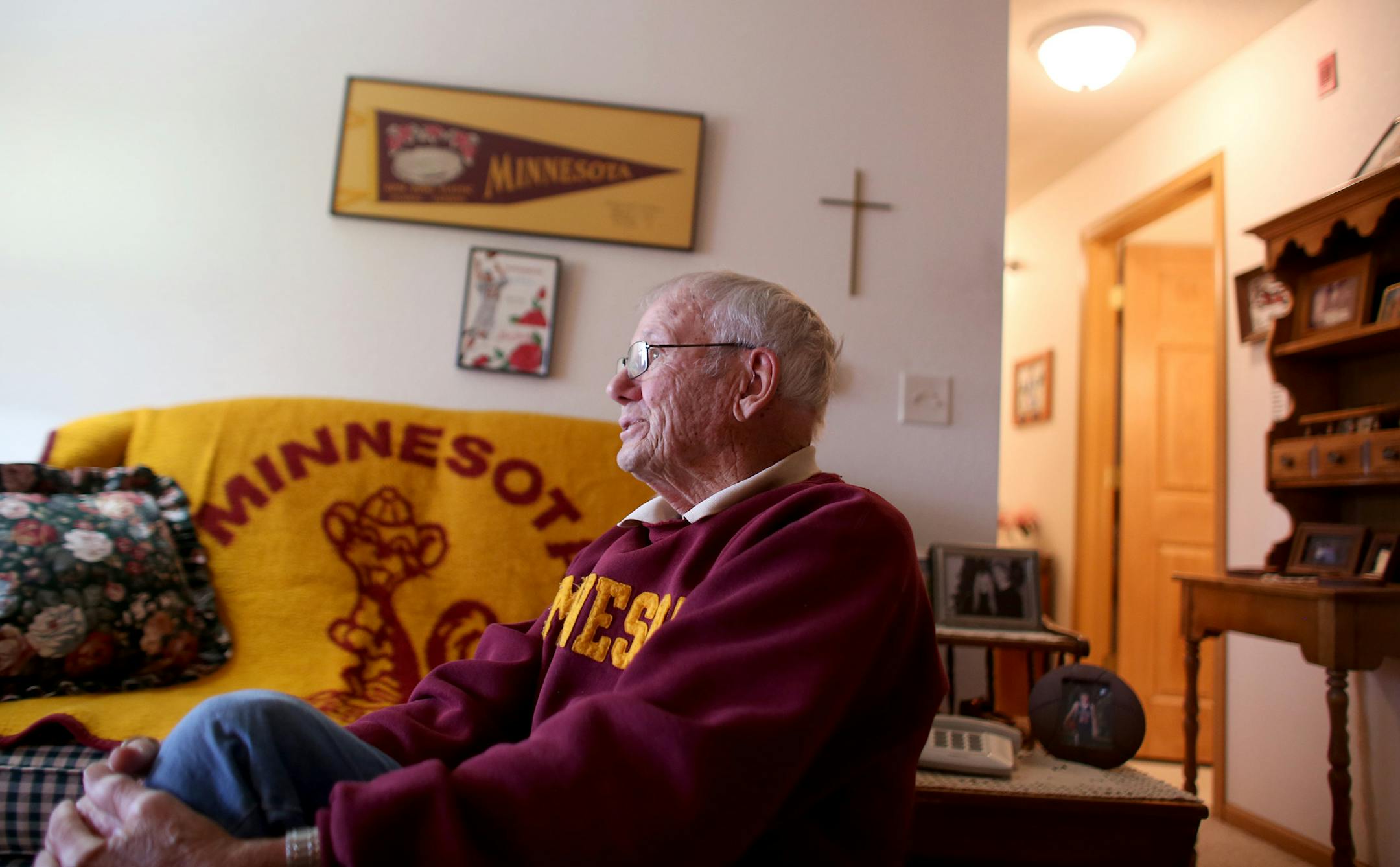 Andy Dyrdal, 91, talked about his memories of Gopher football and basketball including names of players a plays in key games. ] (KYNDELL HARKNESS/STAR TRIBUNE) kyndell.harkness@startribune.com At the home of Gopher fan Andy Dyrdal in Albert Lea Min., Tuesday, December 16, 2014