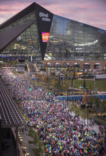 Runners make there wary to the start line for the 10K race at the U.S. Bank Stadium Sunday October 1,2017 in Minneapolis, MN. ] JERRY HOLT &#xef; jerr