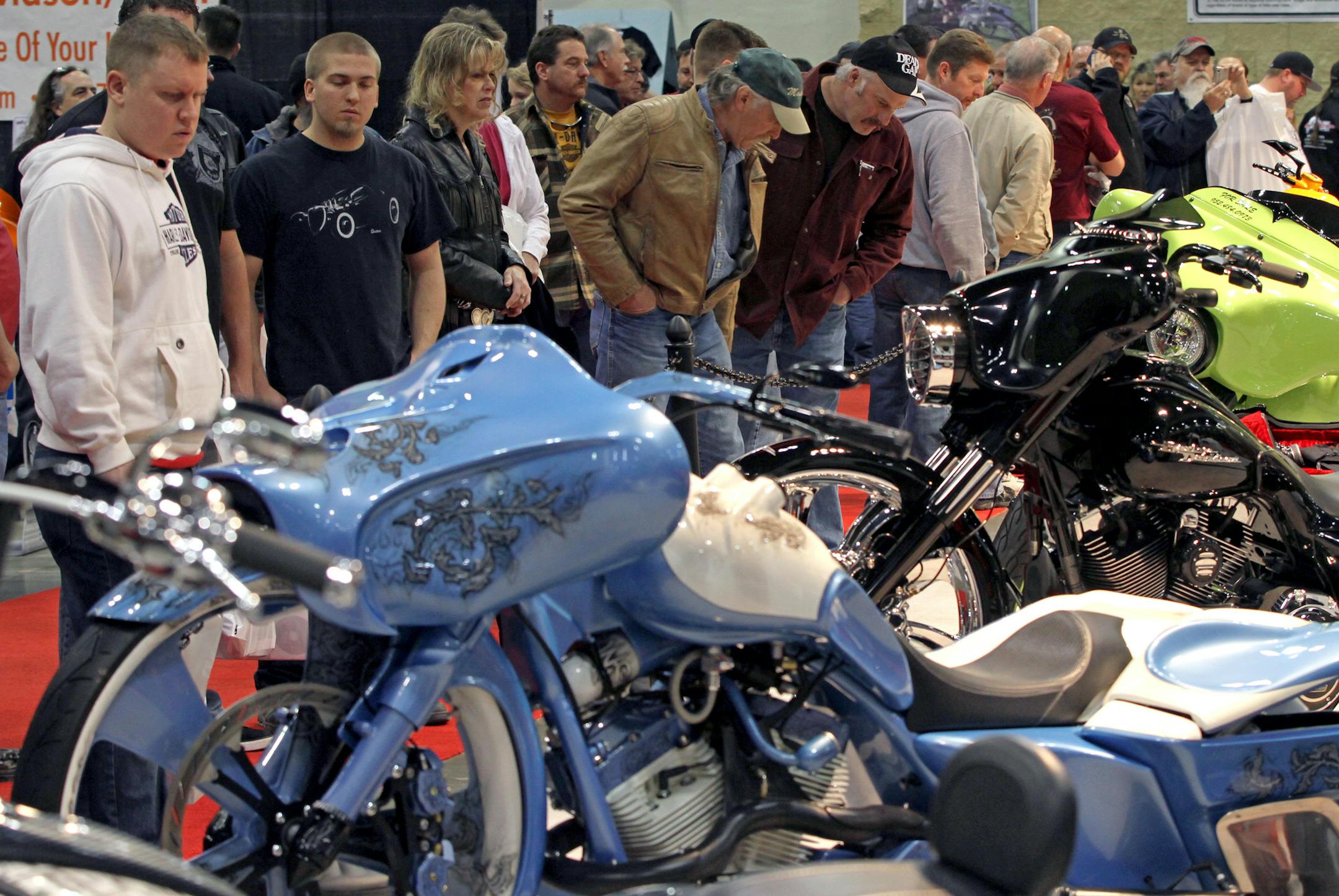 Thousands of people jammed the St. Paul RiverCentre to get a better look at the hundreds of custom bikes on display at the 26th Annual Donnie Smith Bike Show, which runs through Sunday.] The show features custom bike makers, parts and accessories and hundreds of custom bikes and trikes.] Bruce Bisping/Star Tribune bbisping@startribune.com