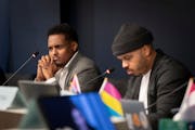 Minneapolis City Council Member Jamal Osman reacts to Council Member Linea Palmisano's proposal to restart rideshare wage negotiations during a counci