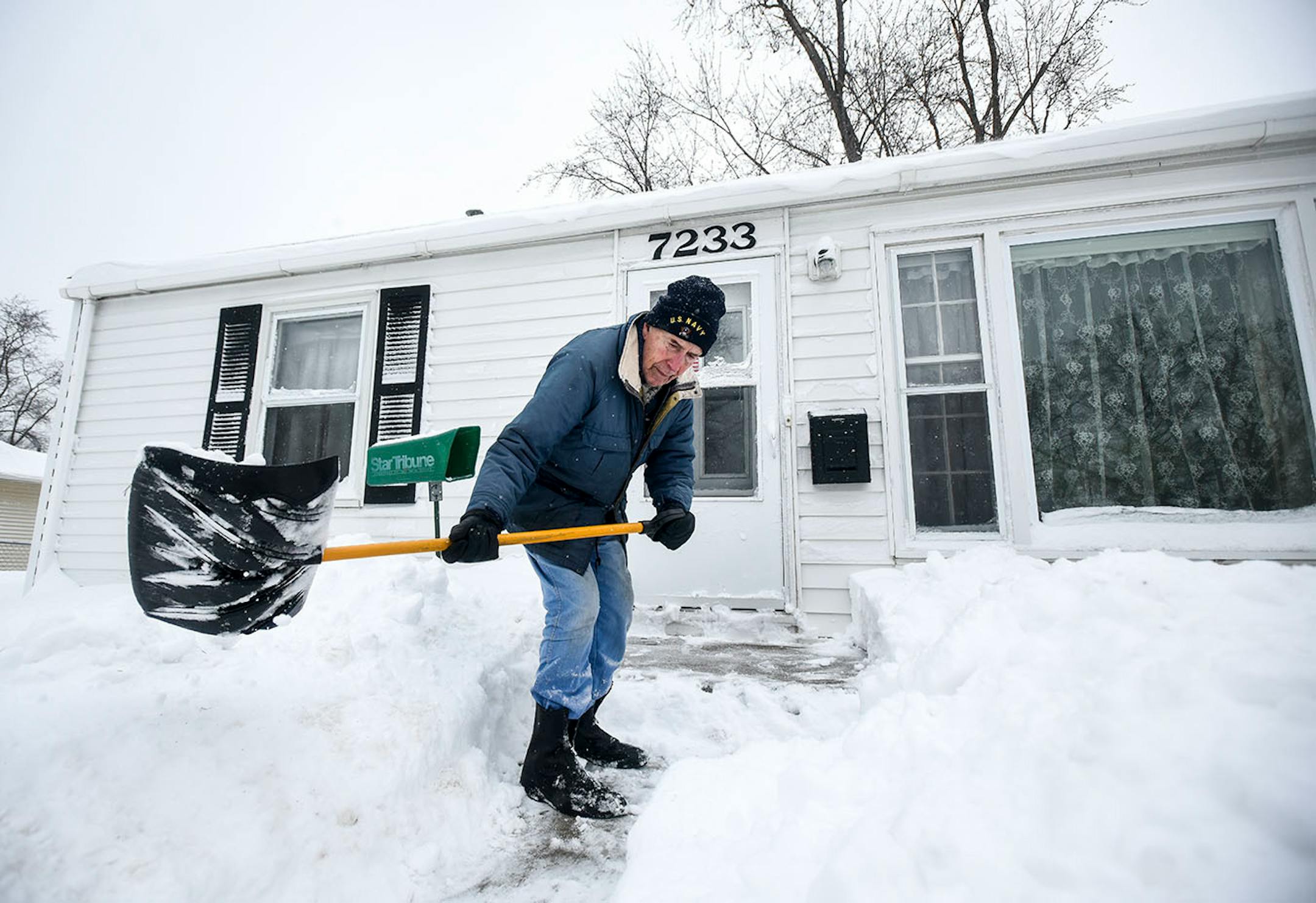 Paul Kaiser, a 91-year old World War II veteran who served in the South Pacific, dug out from the weekend's blizzard outside his Richfield home of 66 years Sunday.