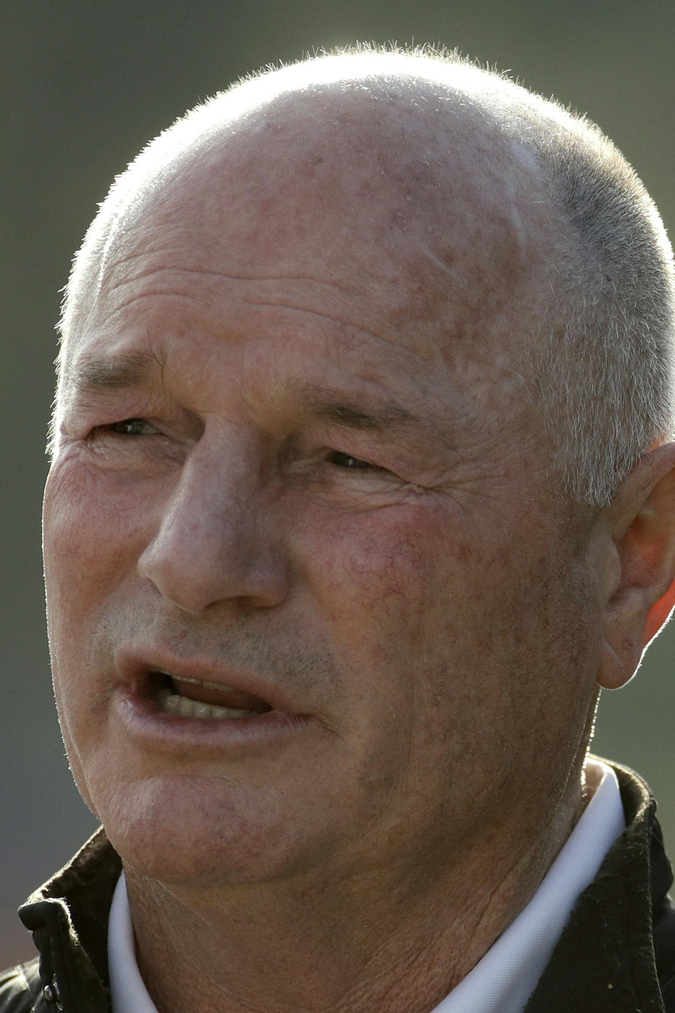 Trainer Richard Mandella talks with friends outside a stall for former Kentucky Derby entrant Omaha Beach at Churchill Downs Thursday, May 2, 2019, in Louisville, Ky. The horse, which was the favorite in the race, dropped out because of a health issue. The 145th running of the Kentucky Derby is scheduled for Saturday, May 4. (AP Photo/Charlie Riedel)