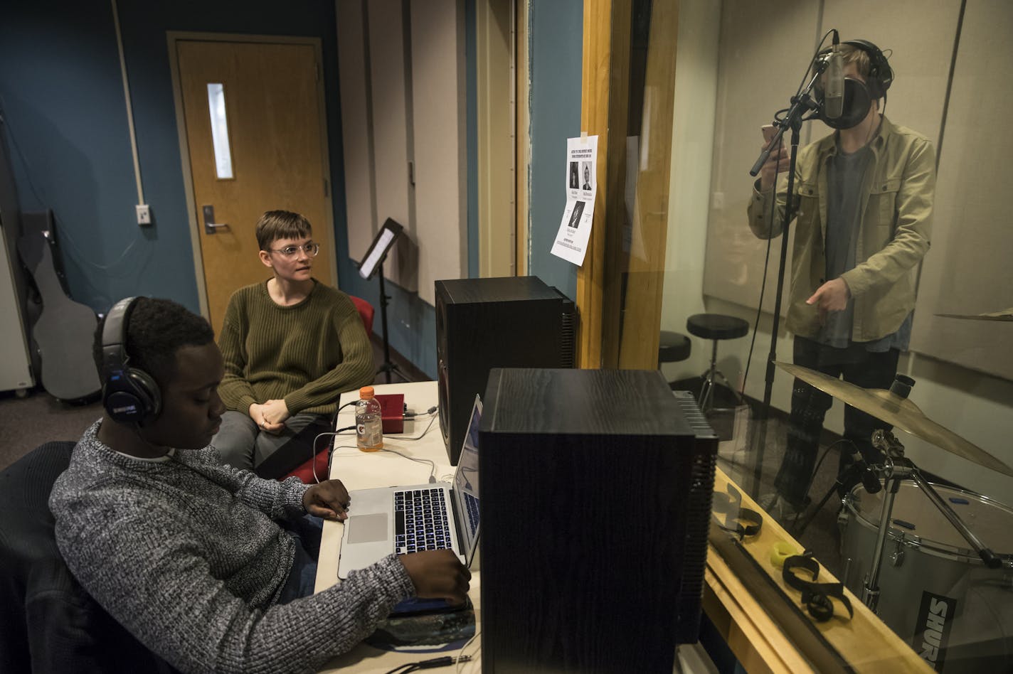 From left, Kevin Lee, Emily Pauly and Josh Groven recorded a rap song in the studio at the School for Environmental Studies on Tuesday. Pauly launched a record label for students in the Rosemount-Apple Valley-Eagan school district to record with.