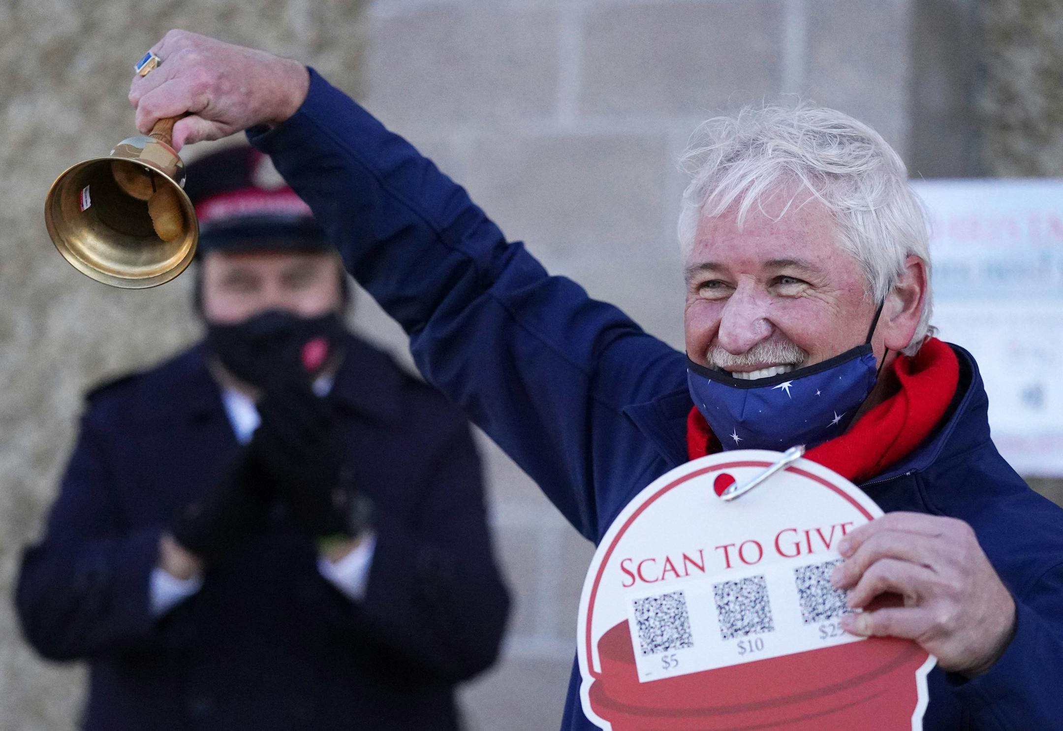 Salvation Army 2020 Red Kettle Community Chair Dan Stoltz, also the President and CEO of SPIRE Credit Union, ran the opening bell during a press conference to kick off The Salvation Army's 2020 Red Kettle season Friday. ] ANTHONY SOUFFLE • anthony.souffle@startribune.com The Salvation Army in the Twin Cities kicked off its 2020 Red Kettle season at an "Opening Bell" press conference Friday, Nov. 13, 2020 at the Cub Community Market on West Broadway Avenue in north Minneapolis.