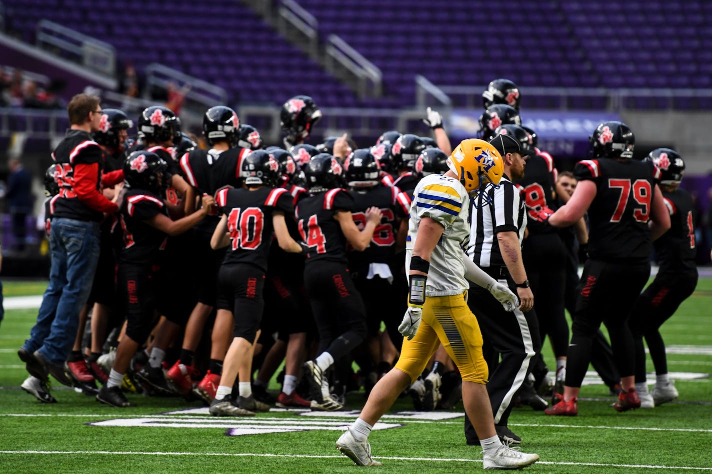 Mayer Lutheran celebrates their victory in the Class 1A state championship football game between Minneota and Mayer Lutheran Friday, Nov. 26, 2021 at U.S. Bank Stadium in Minneapolis, Minn. ] AARON LAVINSKY • aaron.lavinsky@startribune.com