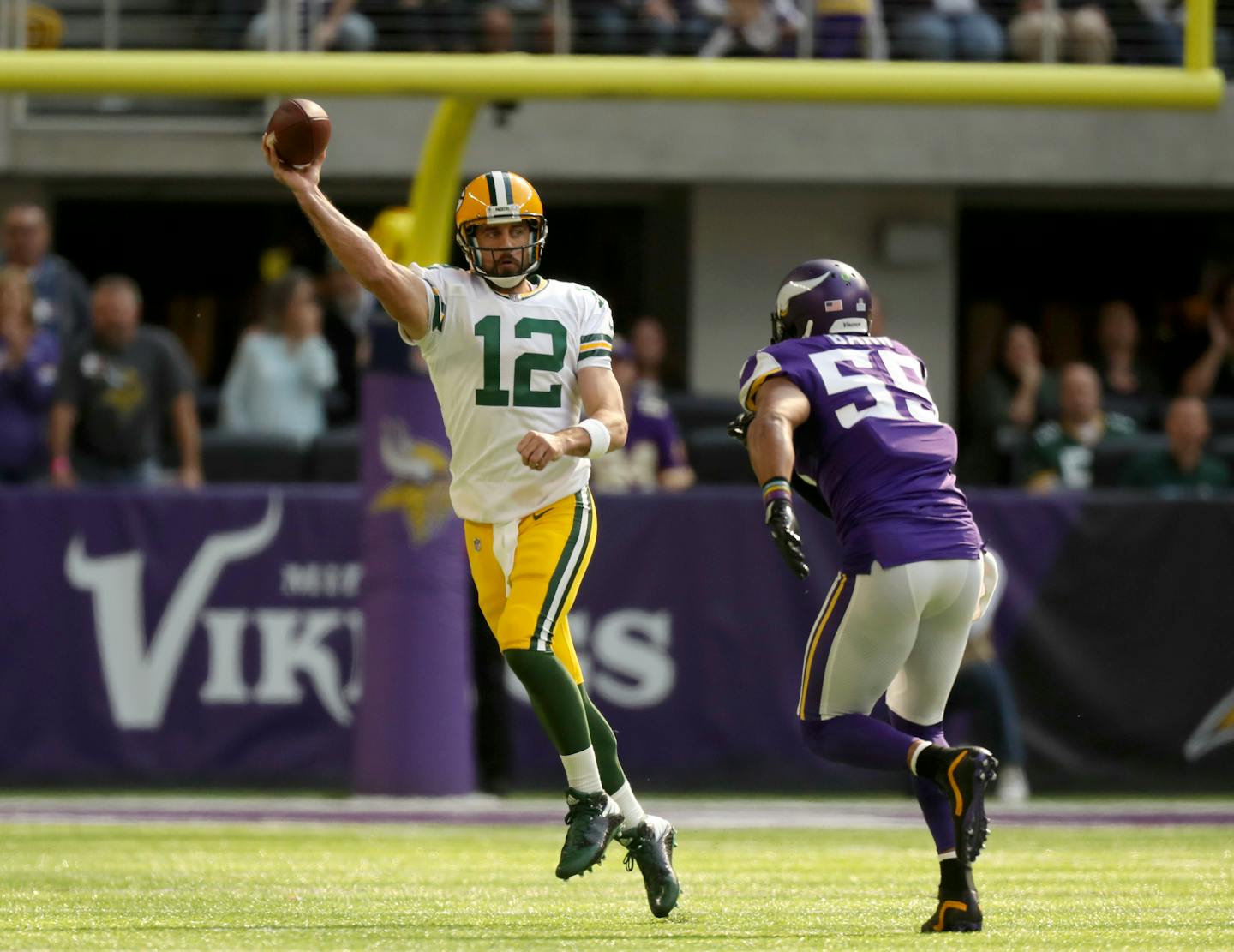 Packers quarterback Aaron Rodgers was tackled just after passing by Vikings linebacker Anthony Barr in the first quarter Sunday and broke his collarbone when he hit the ground. Packers coach Mike McCarthy called the hit "totally unnecessary."