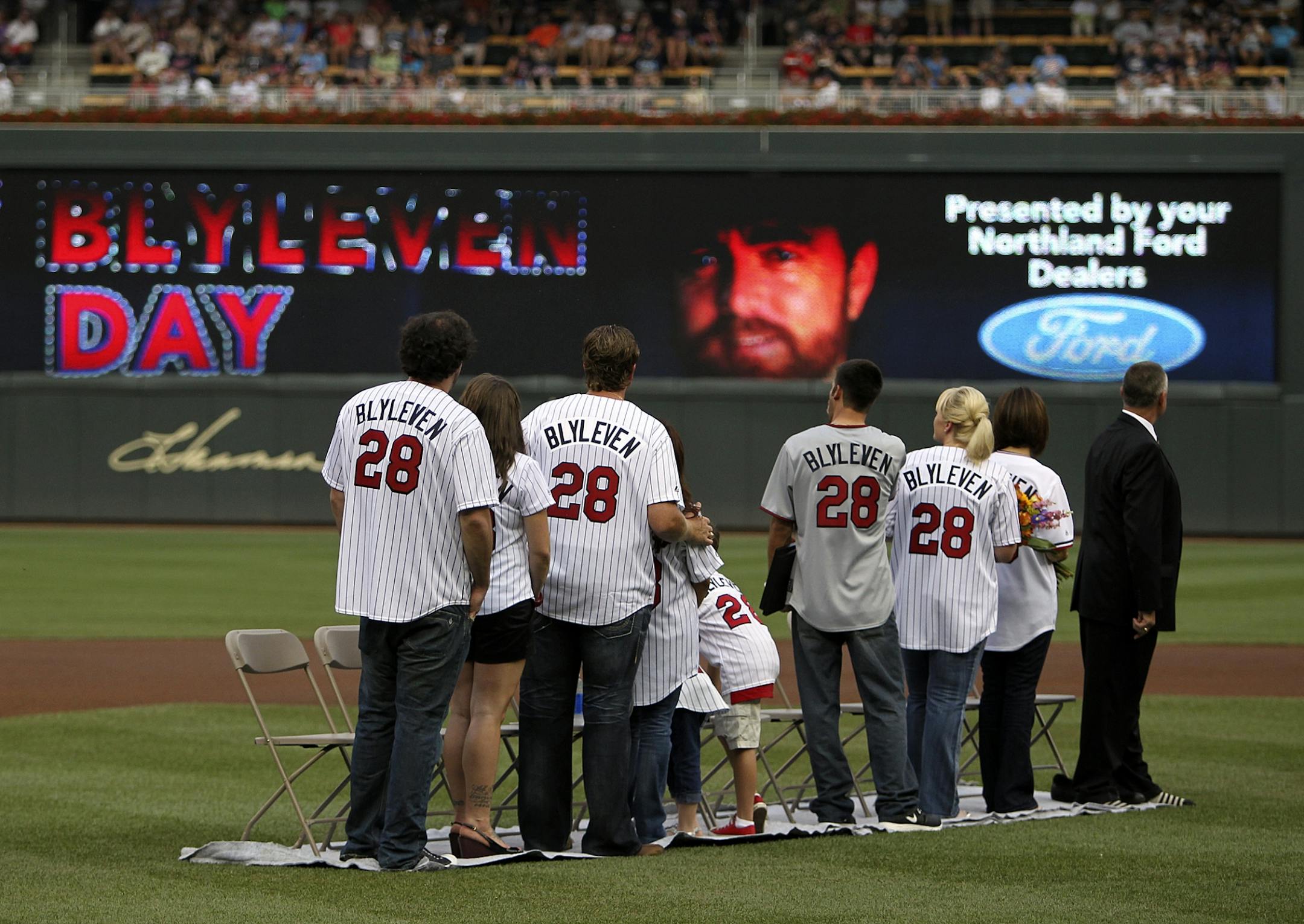 Bert Blyleven's family stands with him during a ceremony to retire his number 28 in preparation for his induction into the Hall of Fame before the Minnesota Twins and Kansas City Royals game at Target Field, Saturday, July 16, 2011.