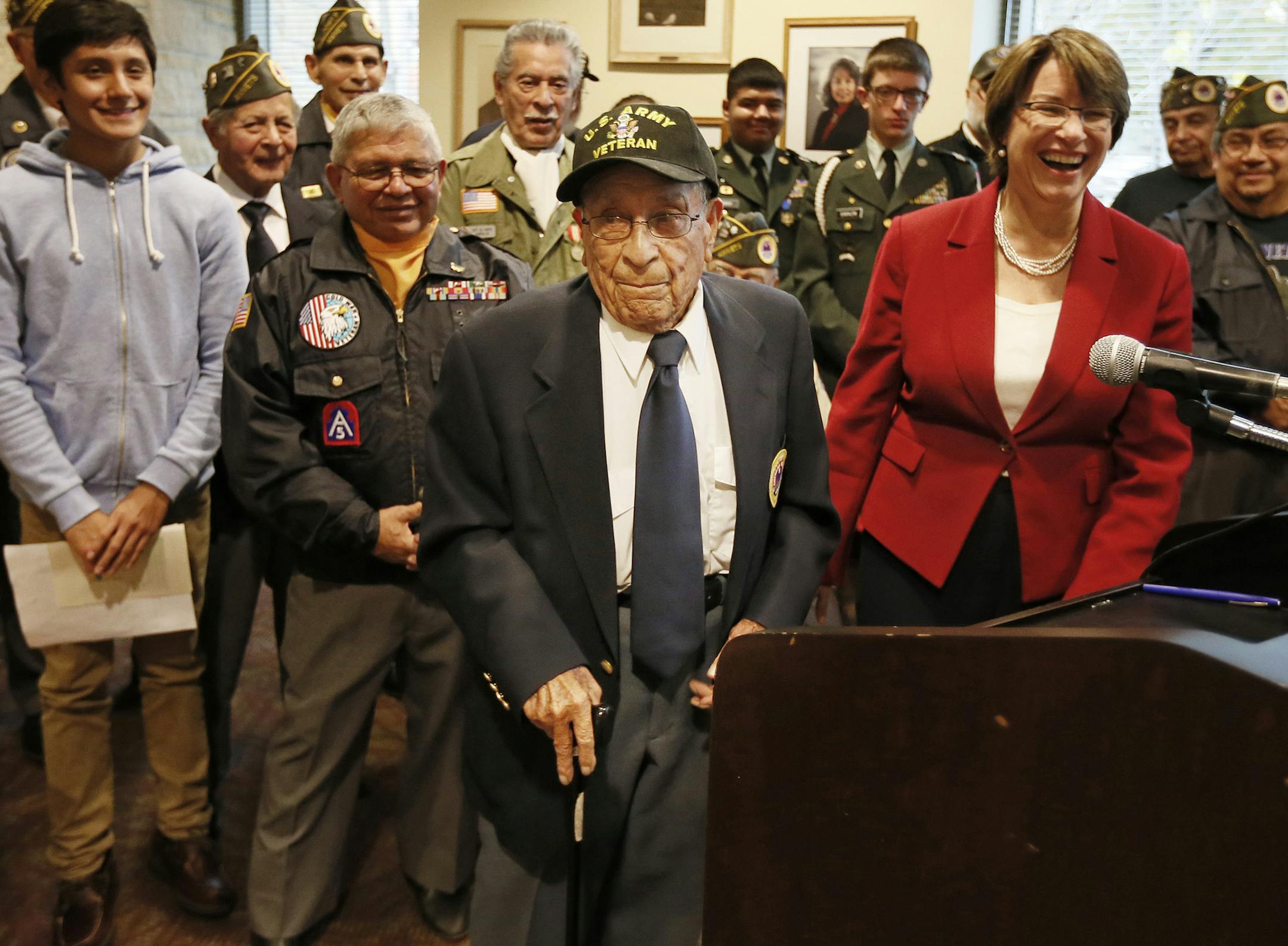 U.S. Senator Amy Klobuchar was joined by Joseph Medina a 99-year-old WWII Veteran during a press conference with Minnesota Veterans to highlight importance of passing comprehensive immigration reform to allow dreamers to serve in the military at the Paul and Sheila Wellstone Center Sunday November 10, 2013 in St. Paul, MN. ] JERRY HOLT ‚Ä¢ jerry.holt@startribune.com