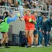 Minnesota Aurora goalkeeper Amanda Poorbaugh bumped fists with teammates during the team’s 5-0 season-opening victory against Rochester FC on May 23