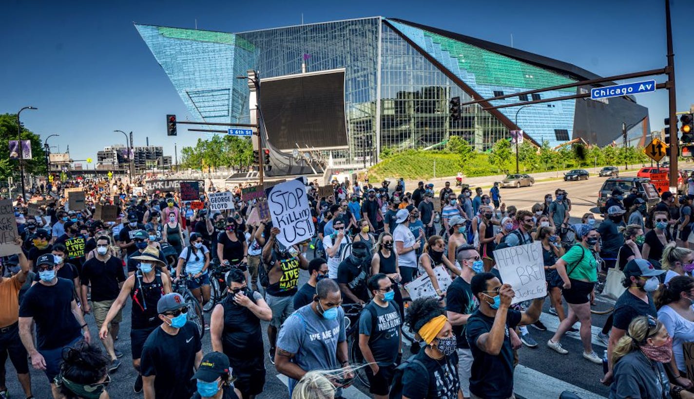 Marchers headed along Chicago Avenue in downtown Minneapolis for a rally Friday called Unfinished Business. Sponsored by the 10K foundation, the march started from U.S. Bank Stadium and then marched toward downtown.