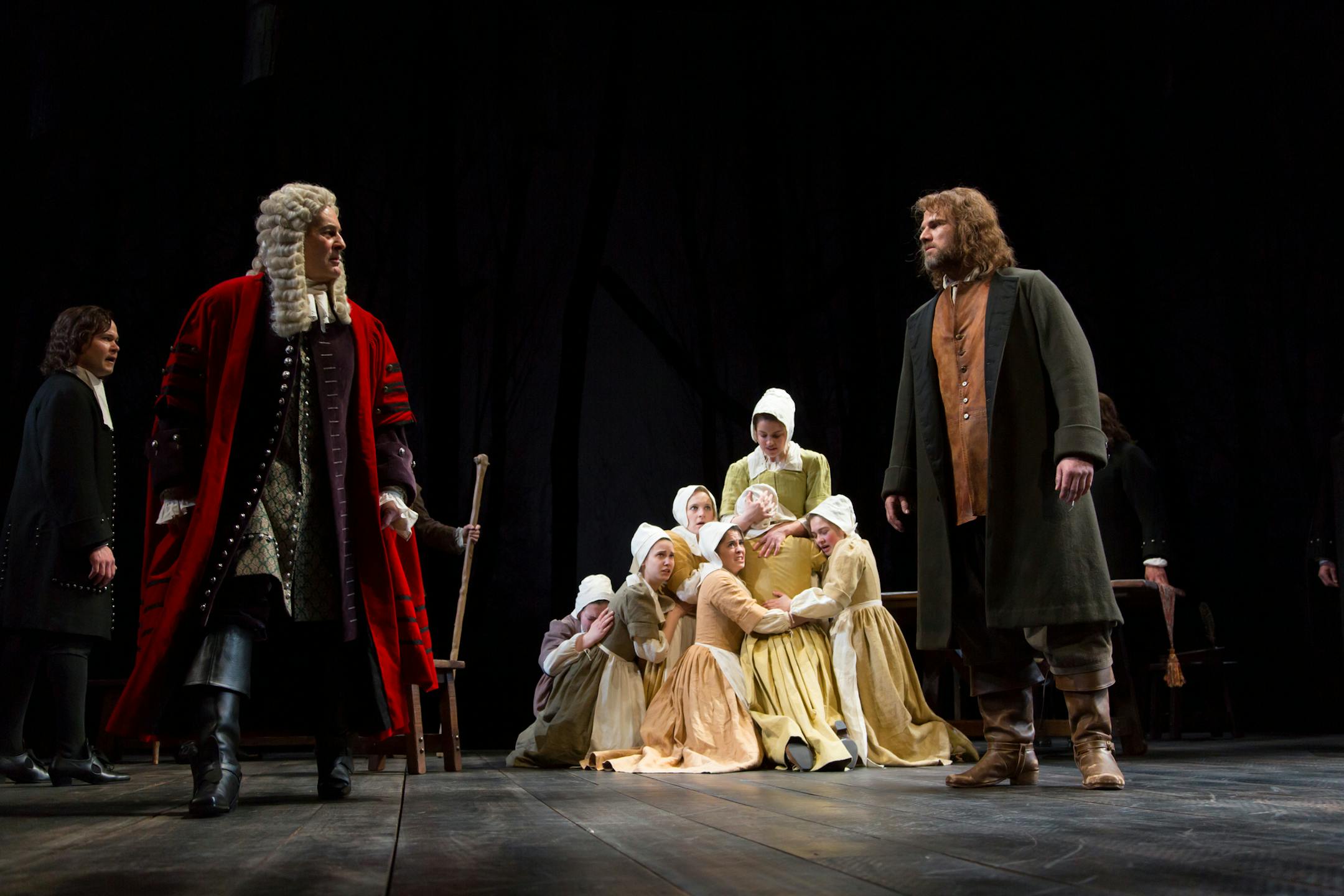 From left, John Catron as Hale, Stephen Yoakam as Danforth, the accusing women, and Erik Heger as Proctor in “The Crucible.”