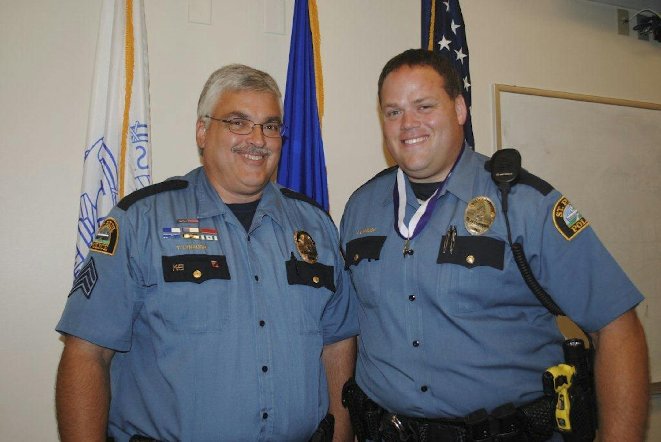 St. Paul police officer Josh Lynaugh, standing with his father, retired Sgt. Tim Lynaugh.