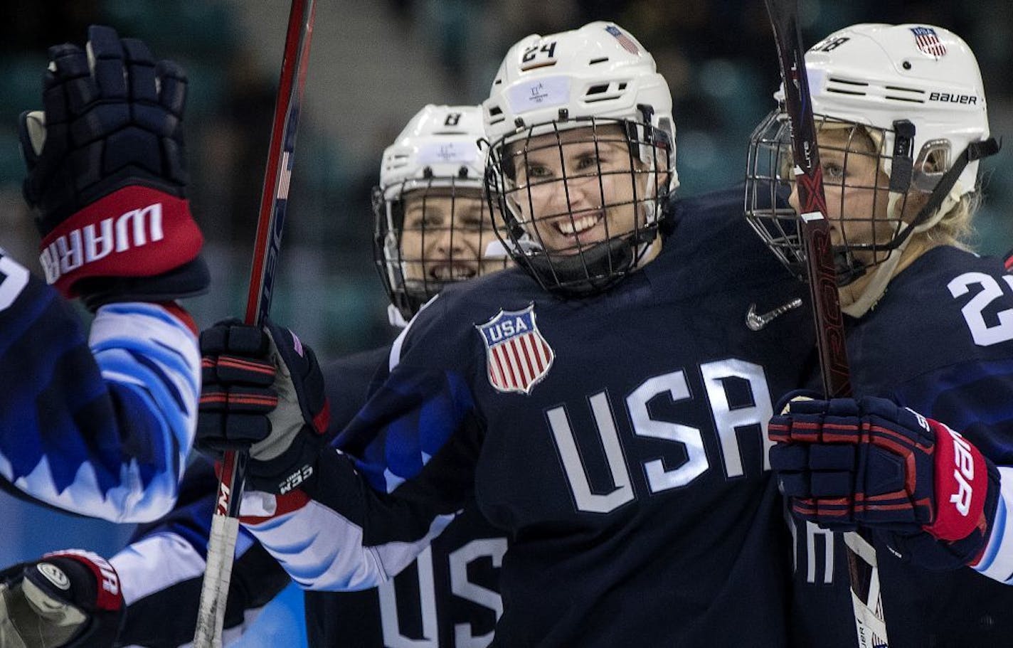 Dani Cameranesi (24) celebrated with teammates after scoring a goal in the third period.