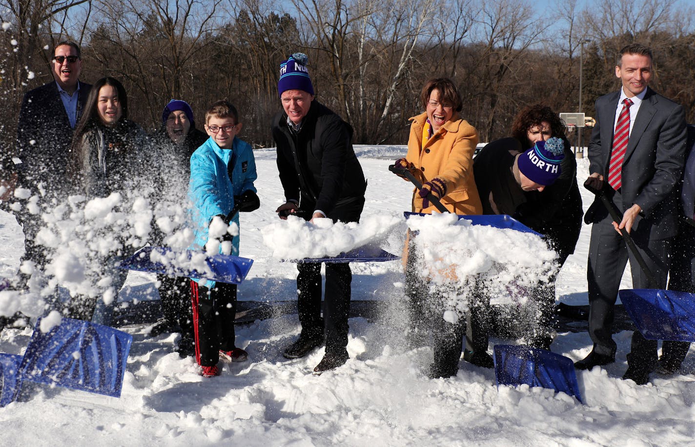 NFL Commissioner Roger Goodell, center, joined Sen. Amy Klobuchar, right, and Minneapolis Mayor Jacob Frey among others for a "snow shoveling ceremony" in place of ground breaking ceremony for the school's new athletic field. ] ANTHONY SOUFFLE &#xef; anthony.souffle@startribune.com Local, state, school, and NFL officials gathered for a pep rally, press conference, and snow shoveling ceremony to announce that Anwatin Middle School will receive a $220,000 grant, the final for the 52 Weeks of Givin