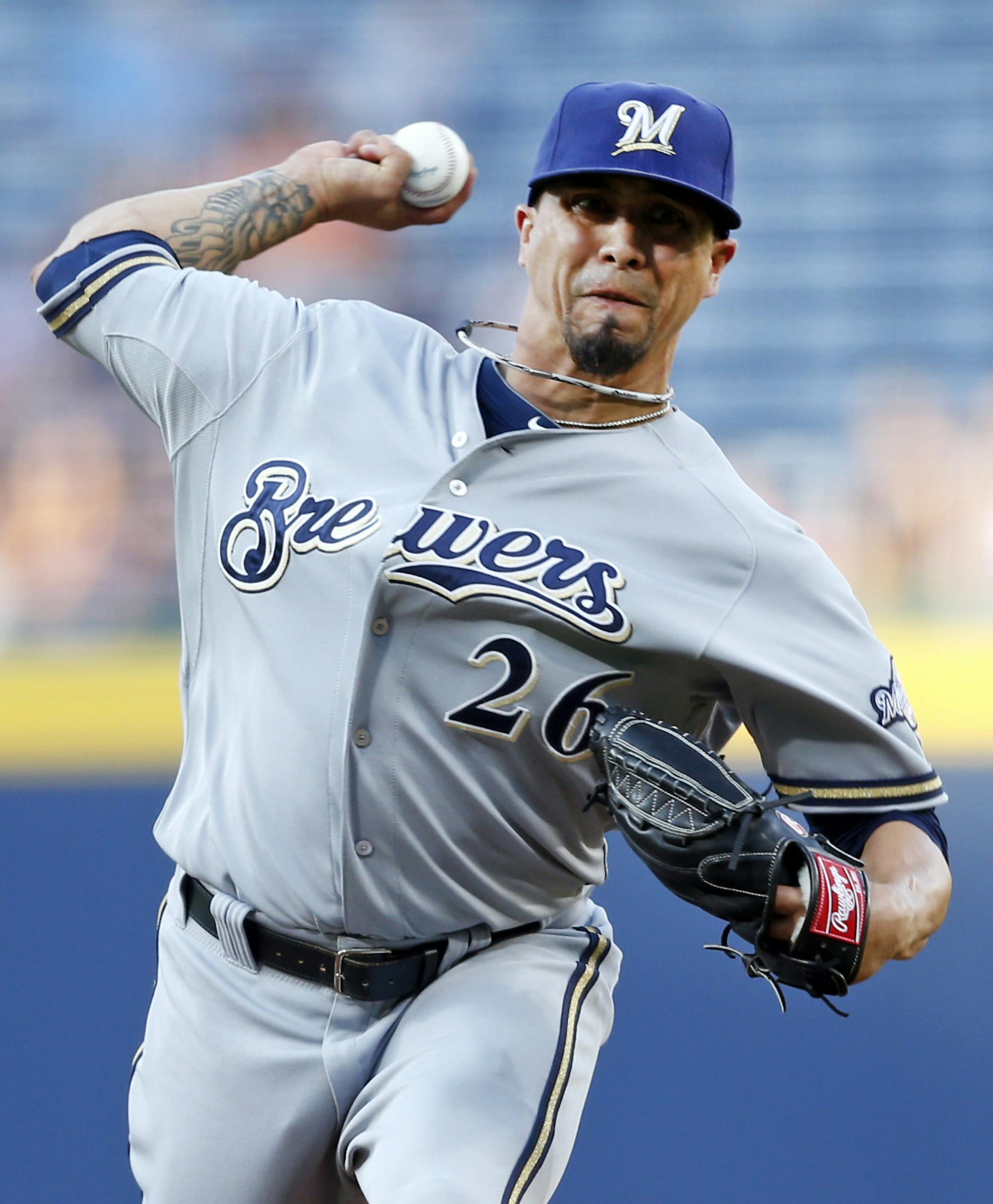 Milwaukee Brewers starting pitcher Kyle Lohse (26) works in the first inning of a baseball game against Atlanta Braves Wednesday, May 21, 2014 in Atlanta. Milwaukee won 6-1. (AP Photo/John Bazemore)