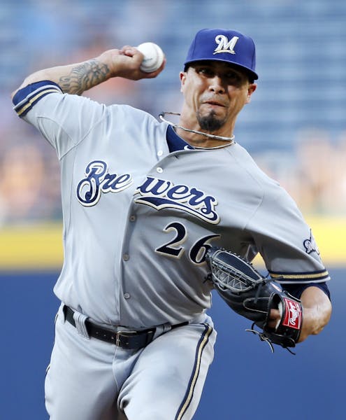 Milwaukee Brewers starting pitcher Kyle Lohse (26) works in the first inning of a baseball game against Atlanta Braves Wednesday, May 21, 2014 in Atla