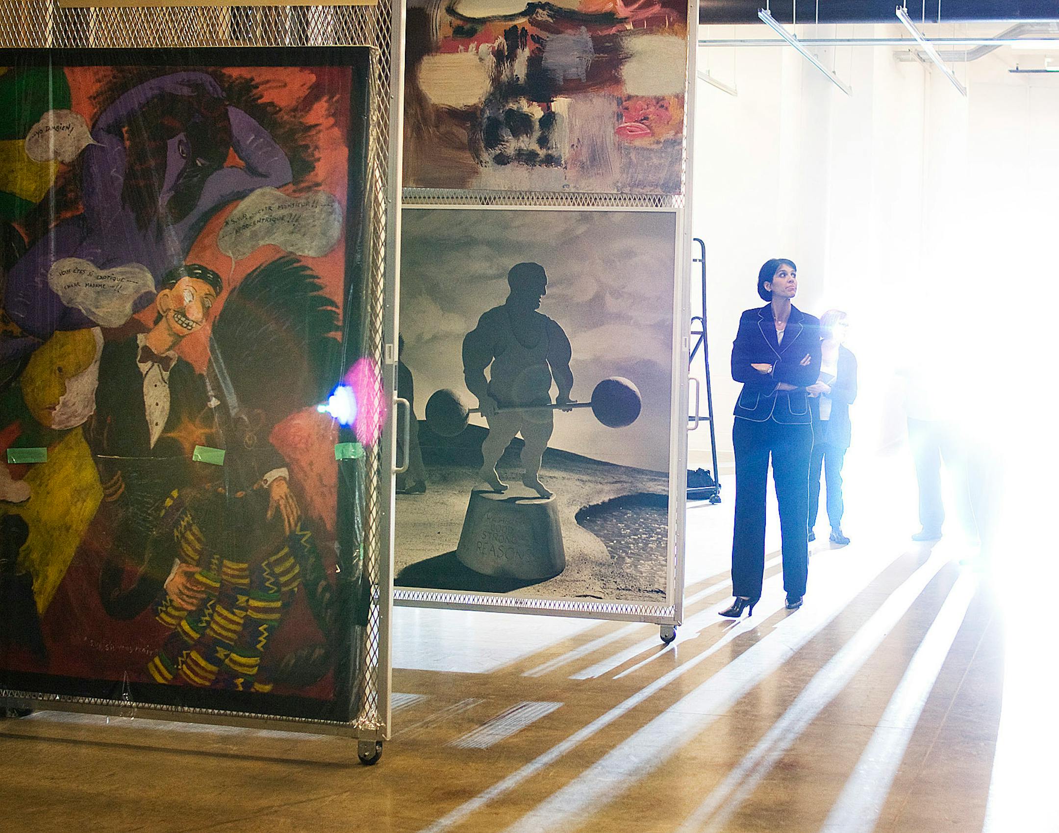 Walker director, Olga Viso, touring the art storage rooms in the lower levels of the museum in 2008.