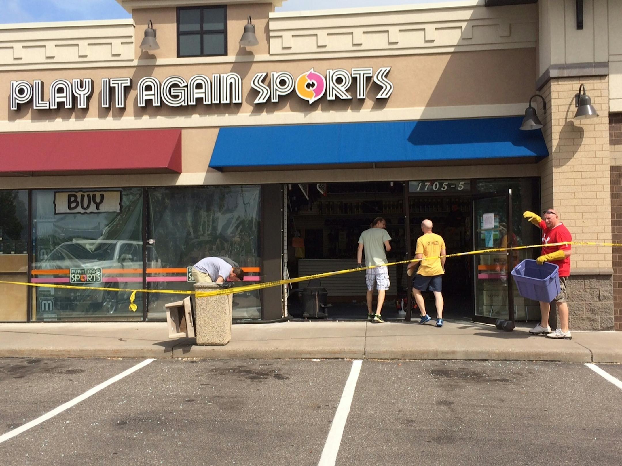 A pickup truck rammed the Play It Again Sports store in Woodbury.