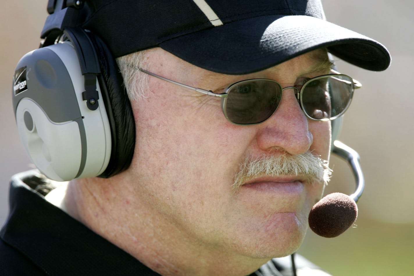 FILE - In this Oct. 7, 2006, file photo, Purdue coach Joe Tiller watches his team during the second half of an NCAA college football game against Iowa, in Iowa City, Iowa. Tiller, the winningest football coach in Purdue history, died Saturday, Sept. 30, 2017, in Buffalo, Wyo., the school said. He was 74. (AP Photo/Charlie Neibergall, File)