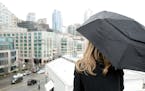 Woman Holding an Umbrella in Seattle.