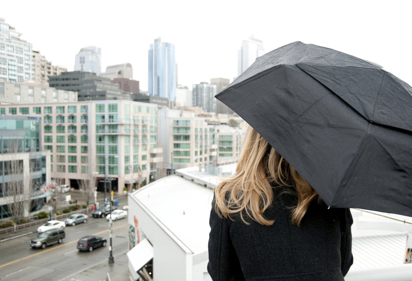 Woman Holding an Umbrella in Seattle.