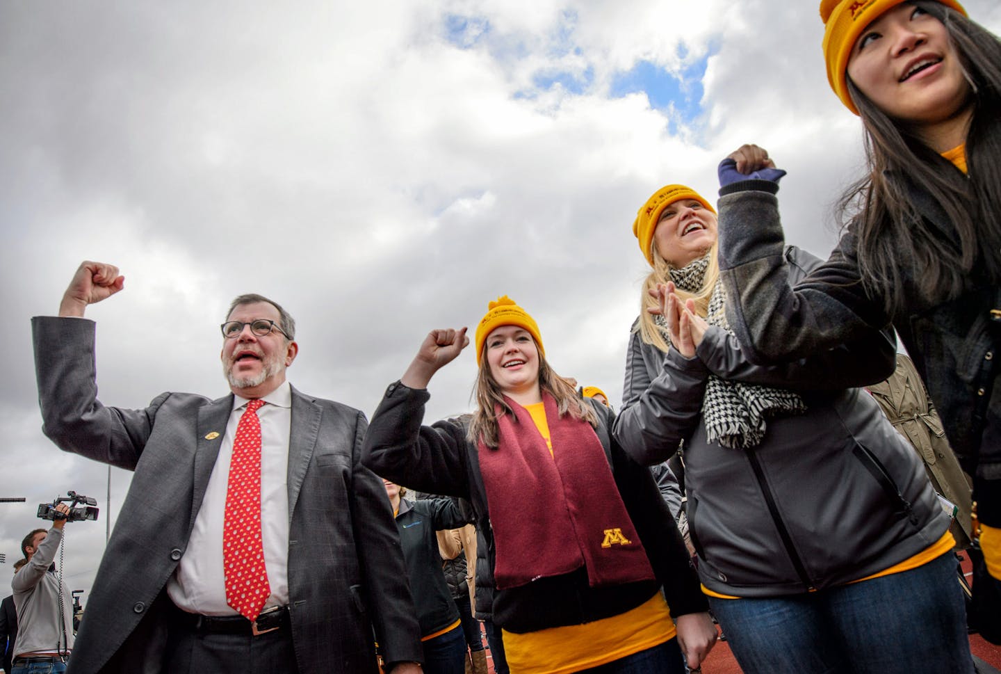 U of M President Eric Kaler joined the crowd in singing the Gopher Rouser song at the end of the ceremony. ] GLEN STUBBE * gstubbe@startribune.com Friday October 30, 2015 A ceremonial groundbreaking at the University of Minnesota for their $166 million Athletes Village project at the Bierman complex.