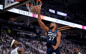 Timberwolves center Rudy Gobert dunks against the Golden State Warriors in the third quarter of Game 5 of their NBA Western Conference playoff semifin