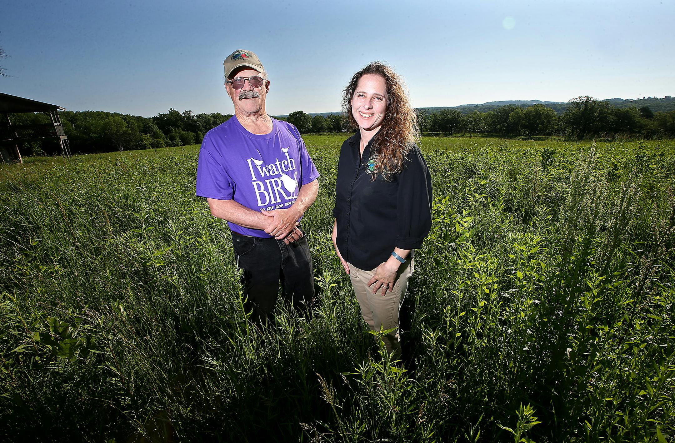 Executive Director of the Carpenter Nature Center, Jennifer Vieth, left, and Jim Fitzpatrick, stood in the area that overlooks part of Washington County's new conservation easement., Friday, June 12, 2015 in the Denmark Township, MN. ] (ELIZABETH FLORES/STAR TRIBUNE) ELIZABETH FLORES • eflores@startribune.com
