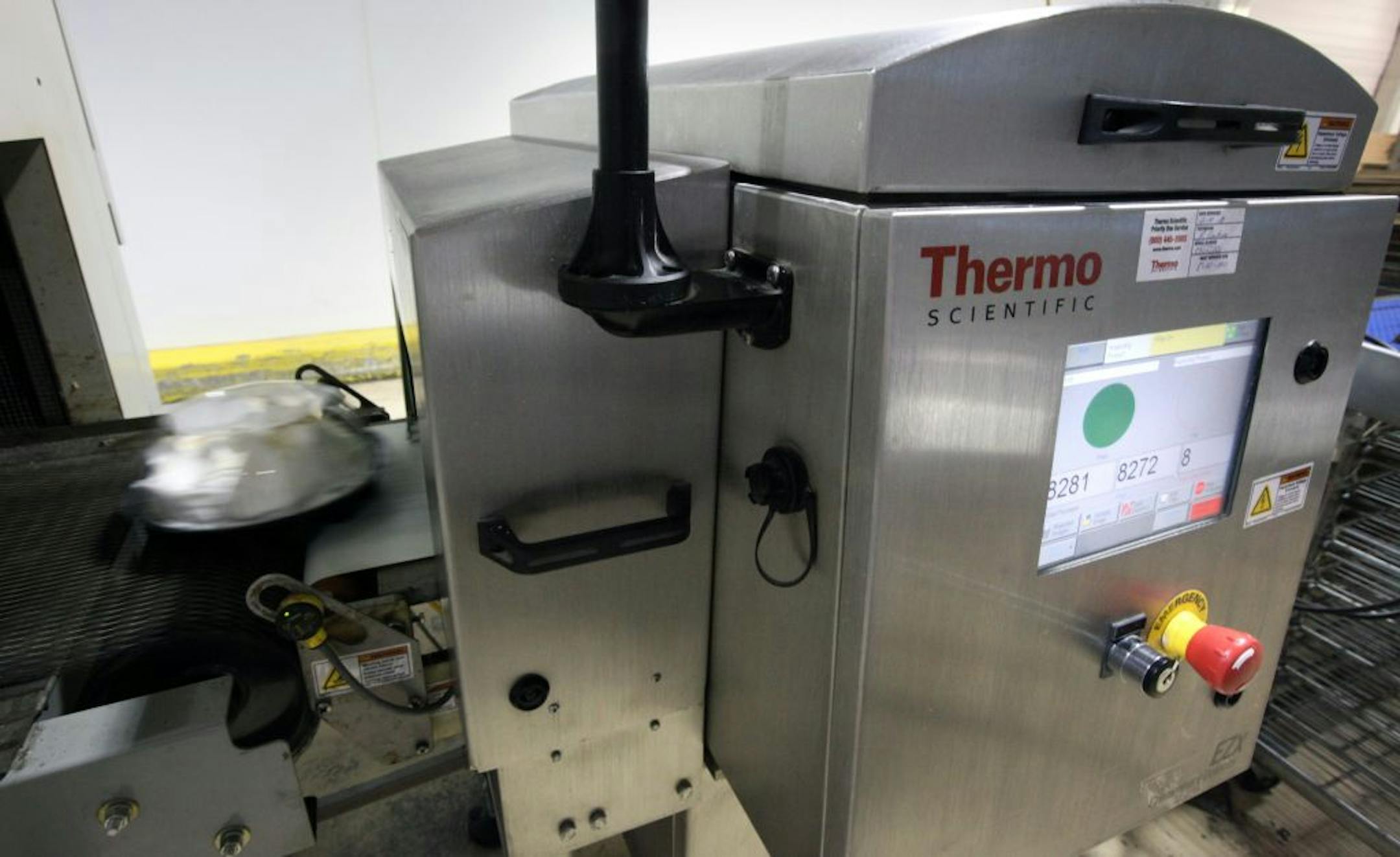 Legendary Baking in Chaska uses x-ray machines made by Thermo Fisher Scientific of Coon Rapids to search for foreign objects (bits of metal, glass or plastic) inside the pies it makes for Baker's Square restaurants and grocery stores. Here, pies enter the x-ray machine at a rate of one or two per second.