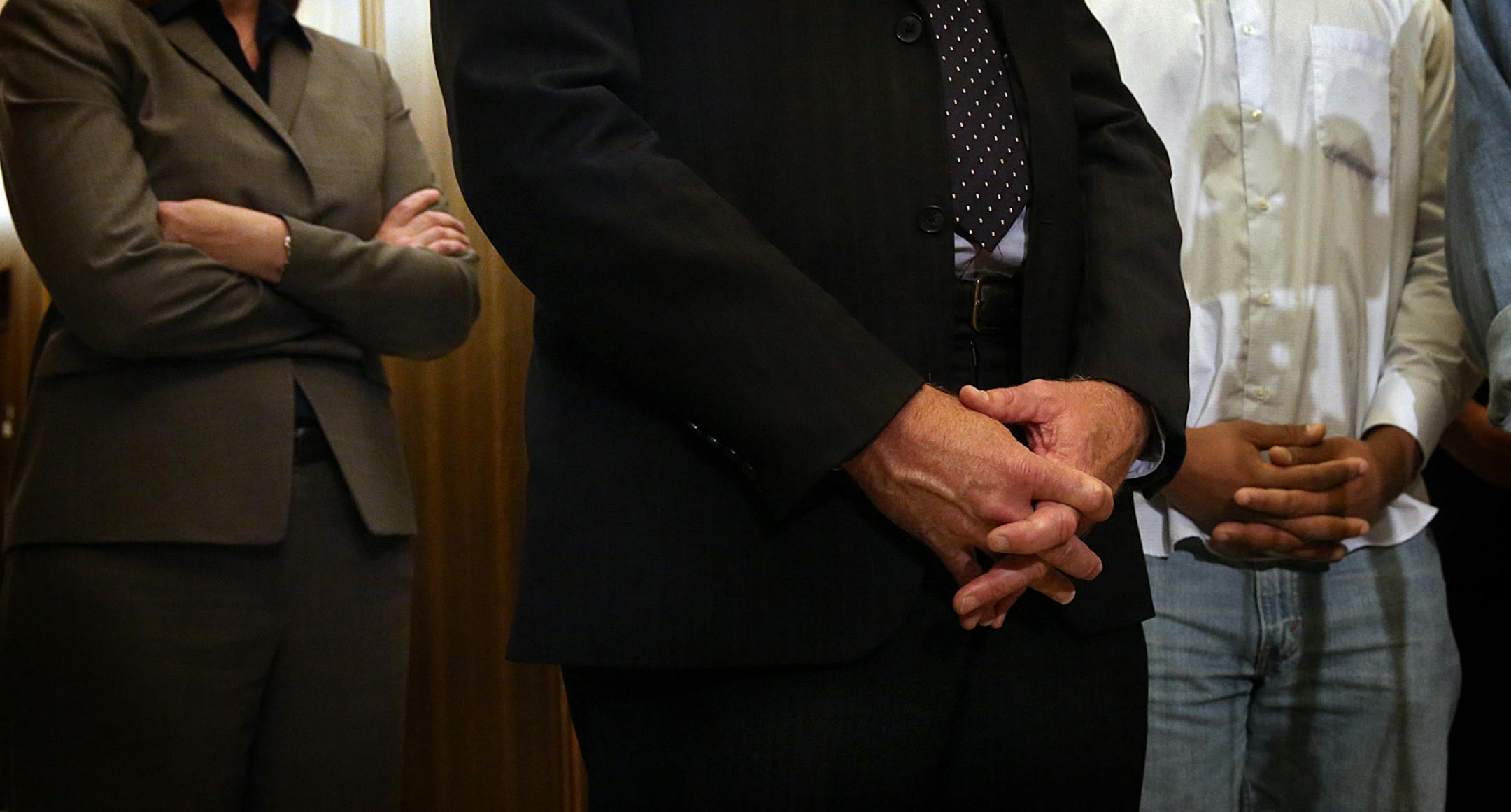 Rashad Turner, the leader of the St. Paul Black Lives Matter group (right), St. Paul Mayor Chris Coleman (middle) and Saint Paul Deputy Mayor, Kristin Beckmann appeared before members of the media following a meeting Thursday morning at the Mayor�s office.