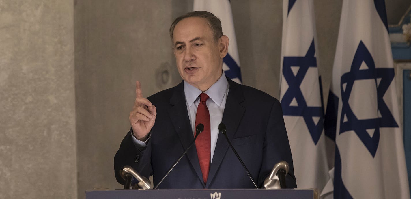 Israeli Prime Minister Benjamin Netanyahu speaks in the synagogue at the Yad Vashem Holocaust Memorial Museum, in Jerusalem, Thursday, Jan. 26, 2017. In remarks at the Holocaust ceremony on Thursday, Netanyahu said President Donald Trump understands the "danger" stemming from the Iran nuclear deal. (AP Photo/Tsafrir Abayov) ORG XMIT: MIN2017012613430021