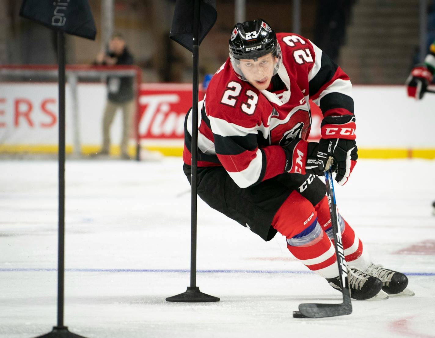 Team red center Marco Rossi (23) skates during the Kubota OHL/NHL Top Prospects skills testing in Hamilton, Ontario, on Wednesday, Jan. 15, 2020. Rossi is a prospect in the upcoming NHL Draft. (Peter Power/The Canadian Press via AP) ORG XMIT: NY152 ORG XMIT: MIN2010061909060767