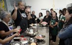 Chef Yia Vang of the pop-up Union Kitchen taught the class with his mother Pang Vang, who has inspired many of his recipes.