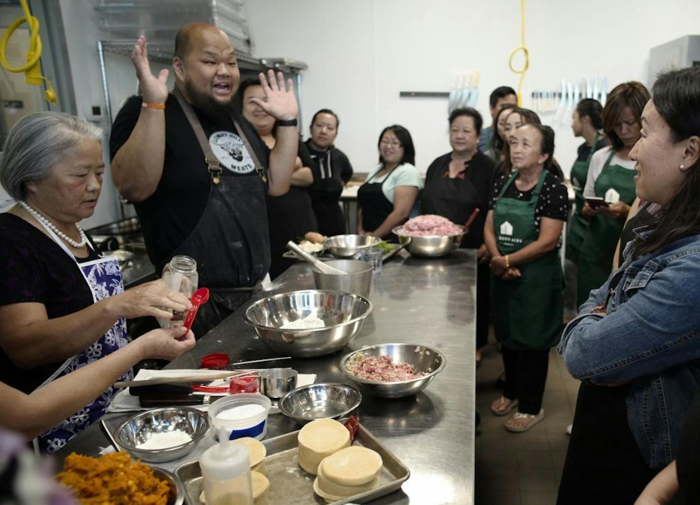 Chef Yia Vang of the pop-up Union Kitchen taught the class with his mother Pang Vang, who has inspired many of his recipes.