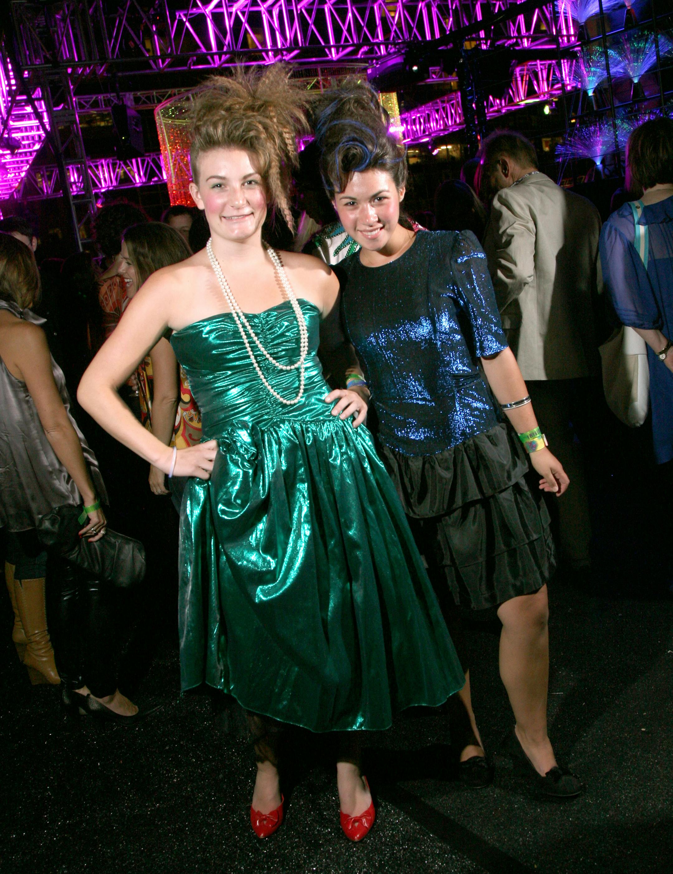 Jordan Anderson and Marisa Montelibano, college freshmen, from Eagan. Both are wearing vintage prom dresses from Everyday People and hair by "Do Hair" in Uptown. "We were in a vintage shop. These are the worst dresses we've seen so they're probably '80s," Anderson said. Relationship: Neighbors for 7 years. Anderson's most influential 1980s icon: "Michael Jackson and Prince. I listen to 'Purple Rain' during yoga." Montelibano's most influential 1980s icon: "I was born in the '90s. Sorry!"